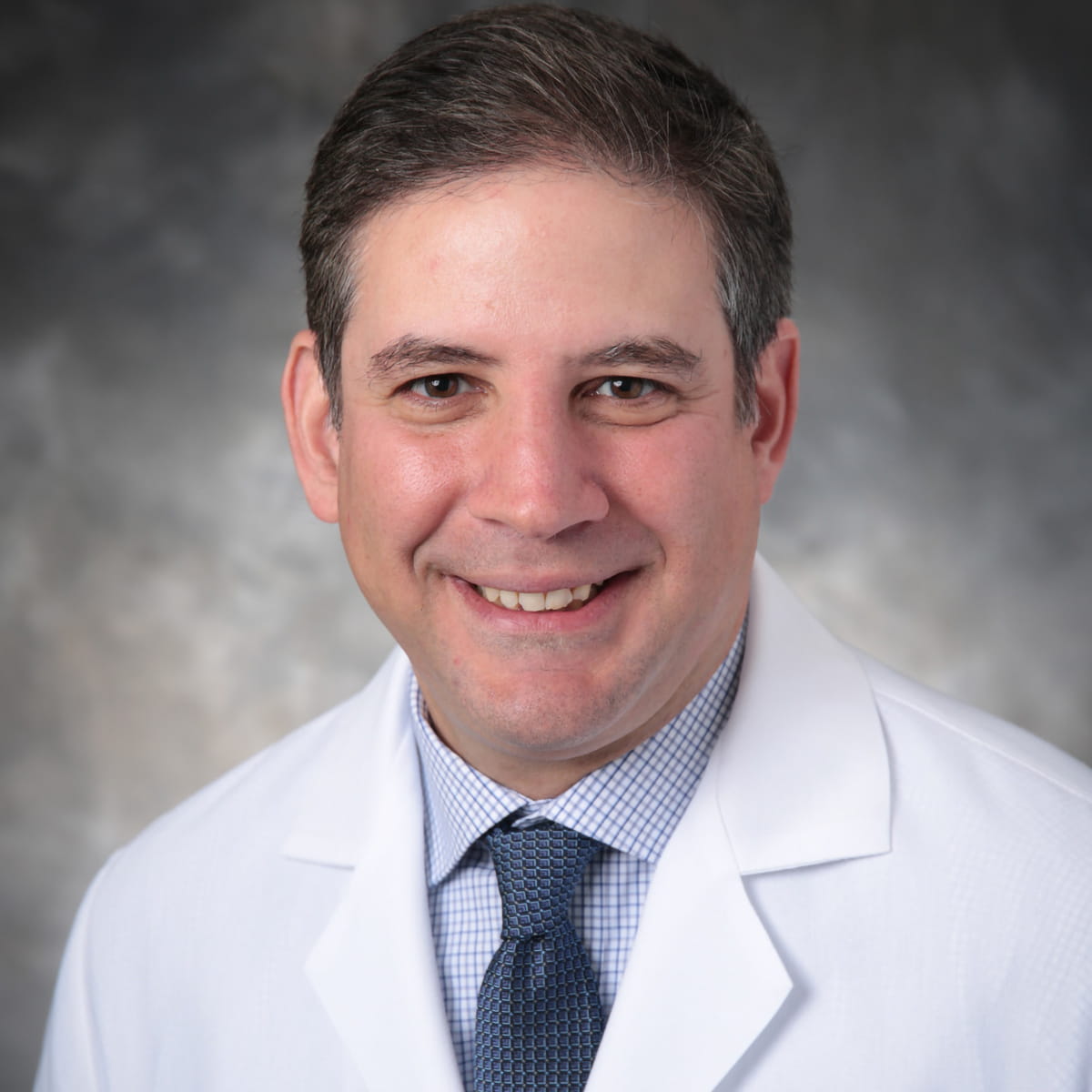 A friendly headshot of David Jacoboff, MD