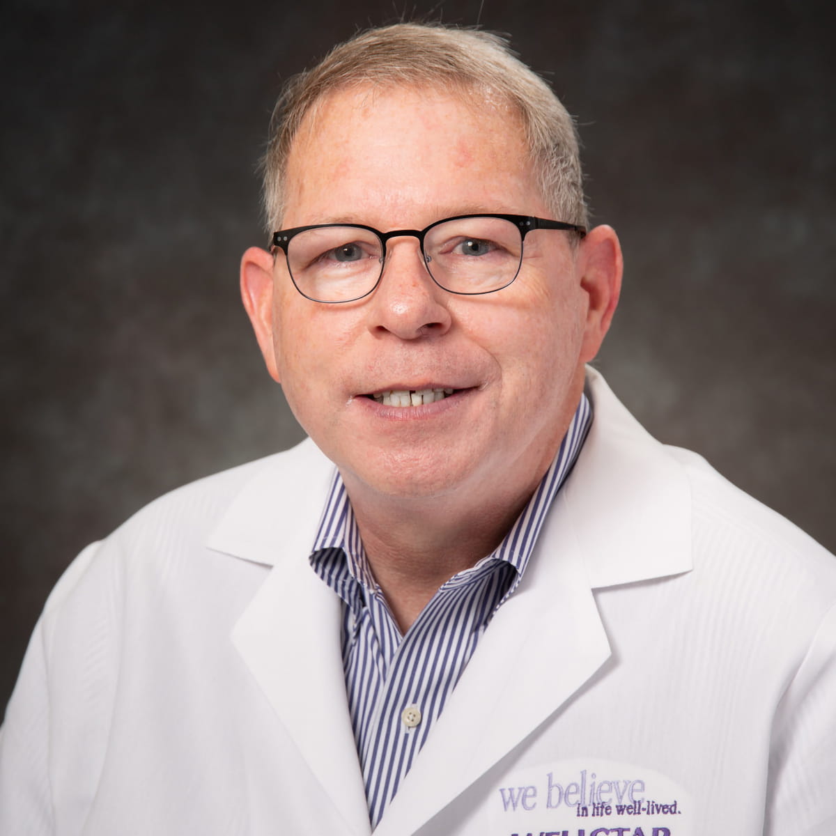 A friendly headshot of David Riden, MD