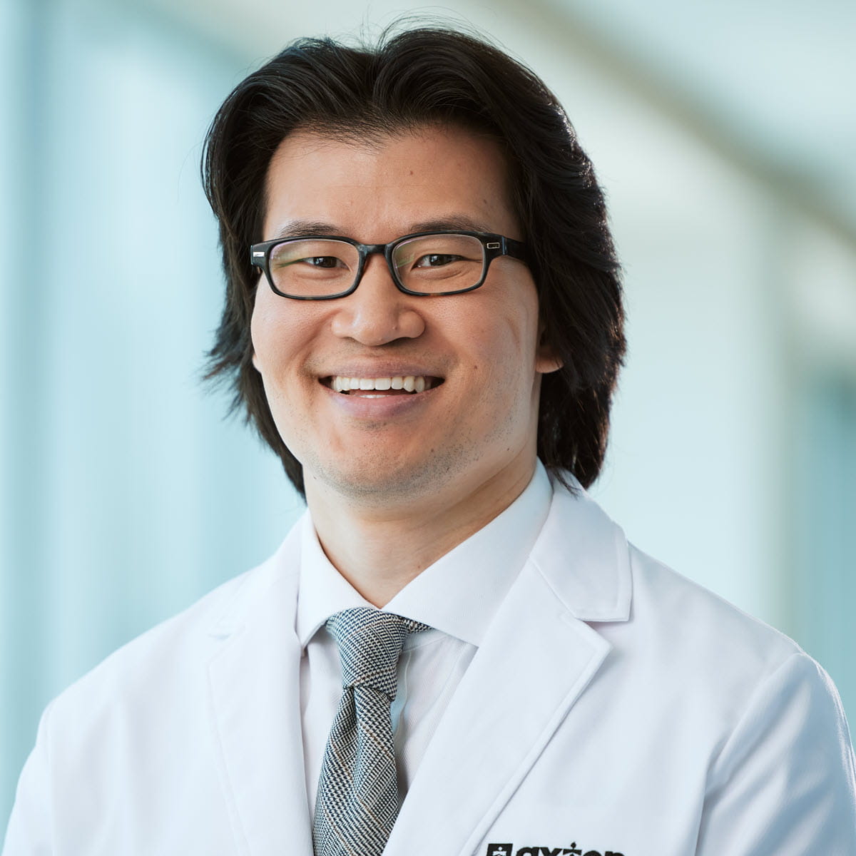 A friendly headshot of David Tran, MD
