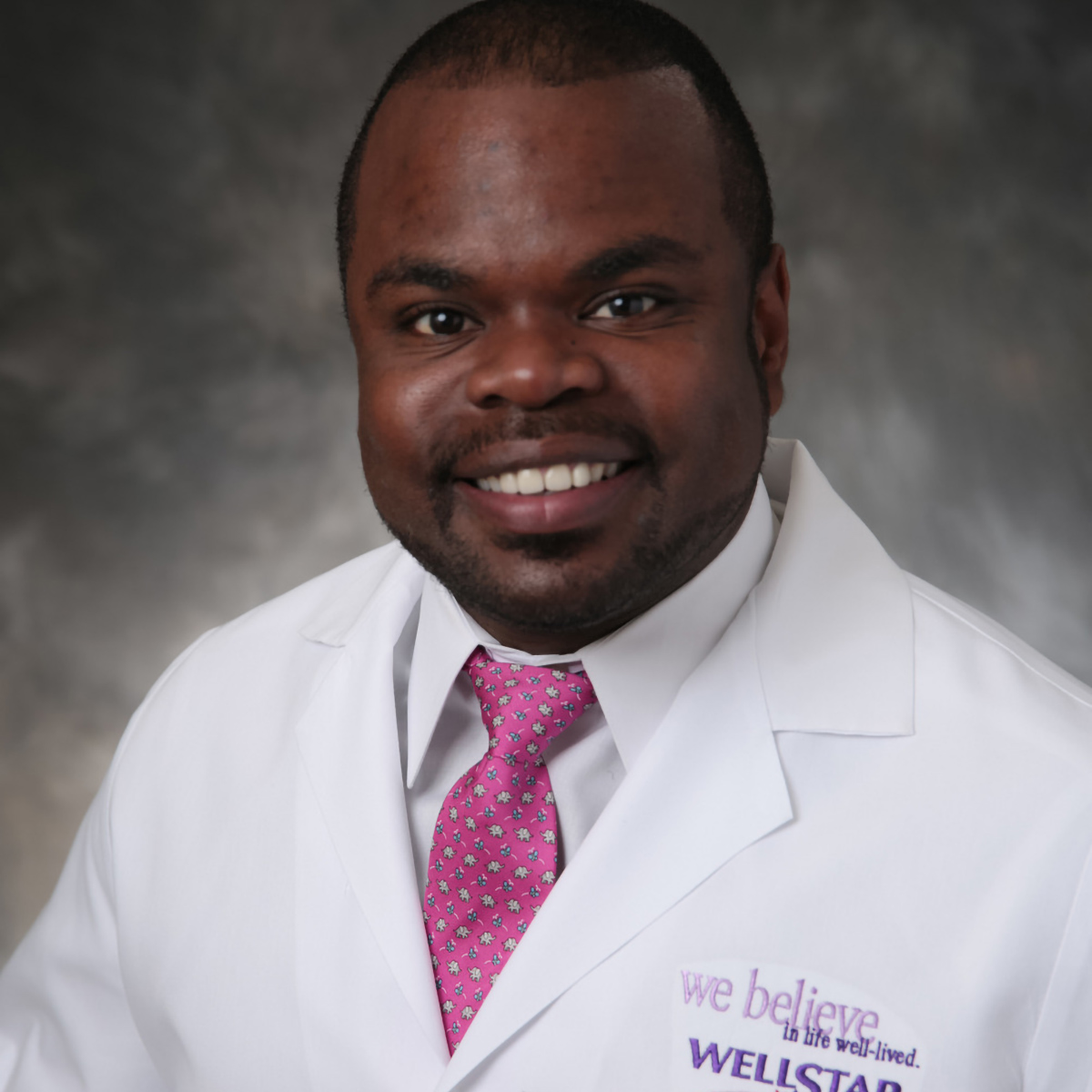 A friendly headshot of Demetrius Woods, MD