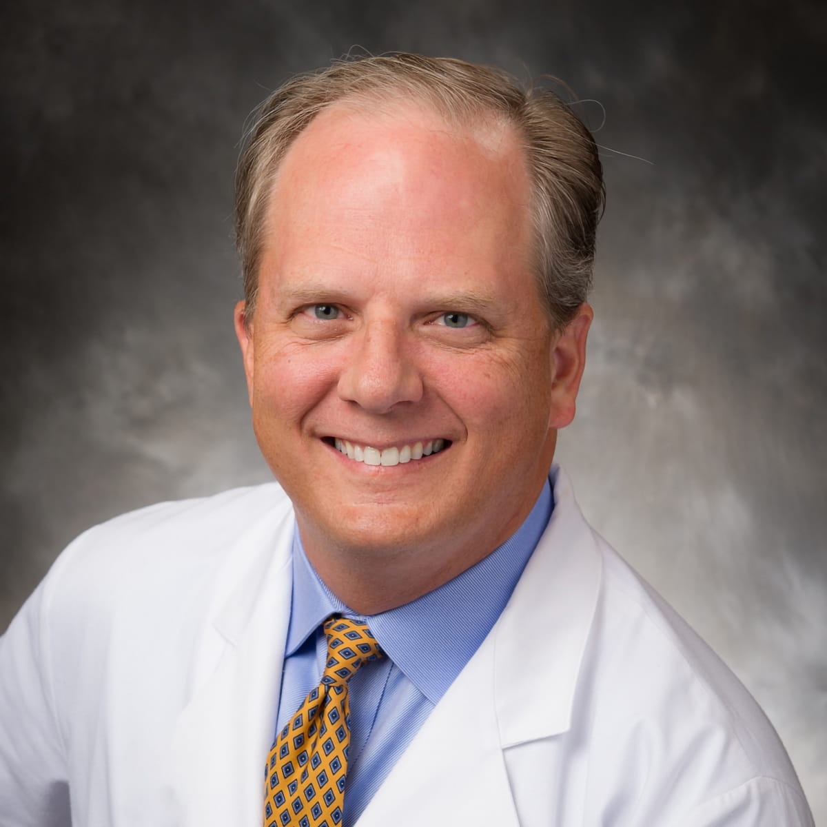 A friendly headshot of Douglas Lundy, MD