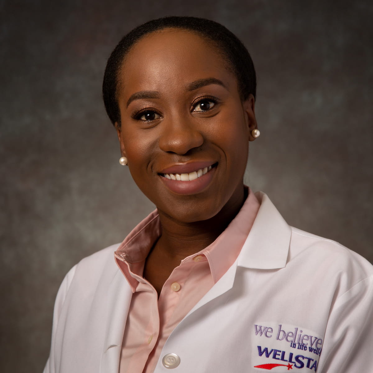 A friendly headshot of Francheska Alcide, MD