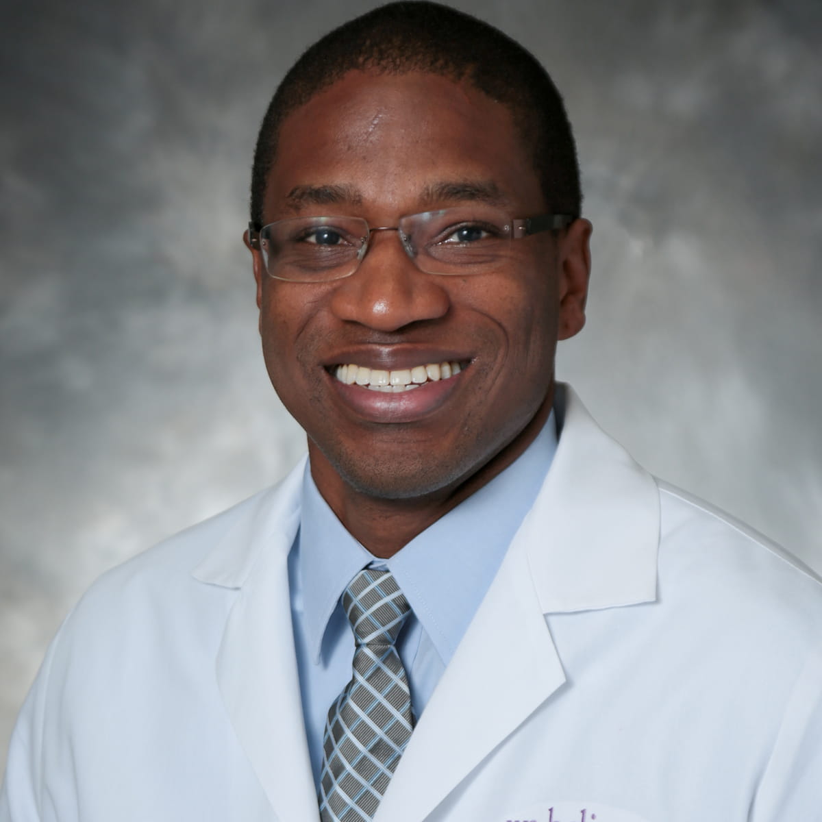 A friendly headshot of Gregory Jones, MD