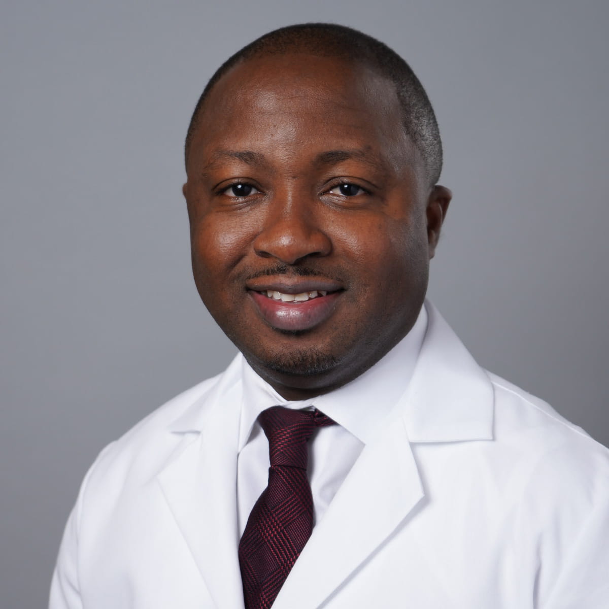 A friendly headshot of Iwayemi Olayeye, MD