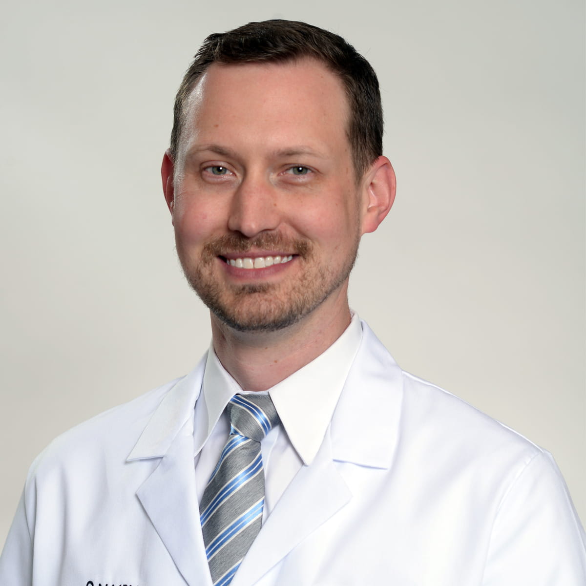 A friendly headshot of James Depew, MD