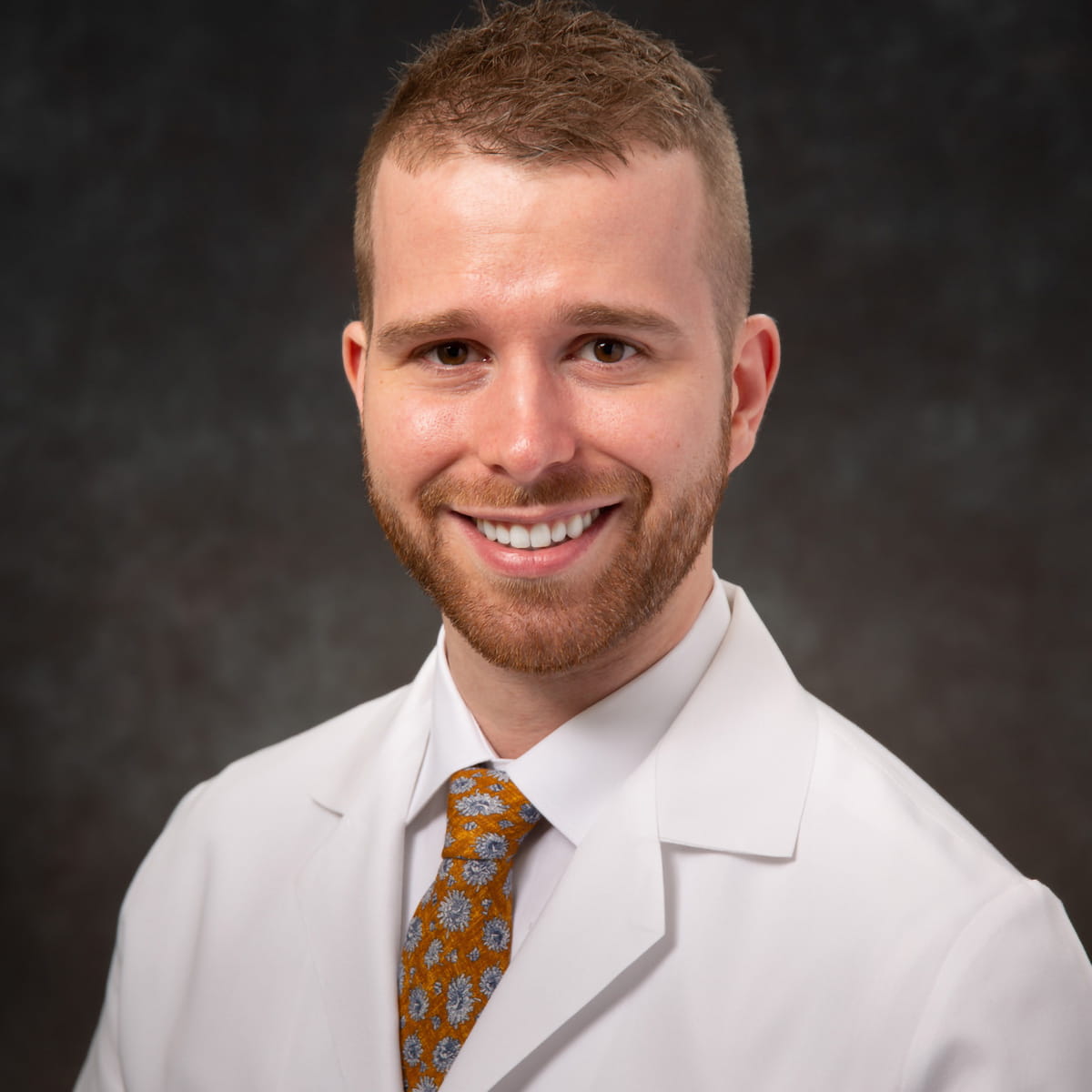 A friendly headshot of Jared Breyley, MD