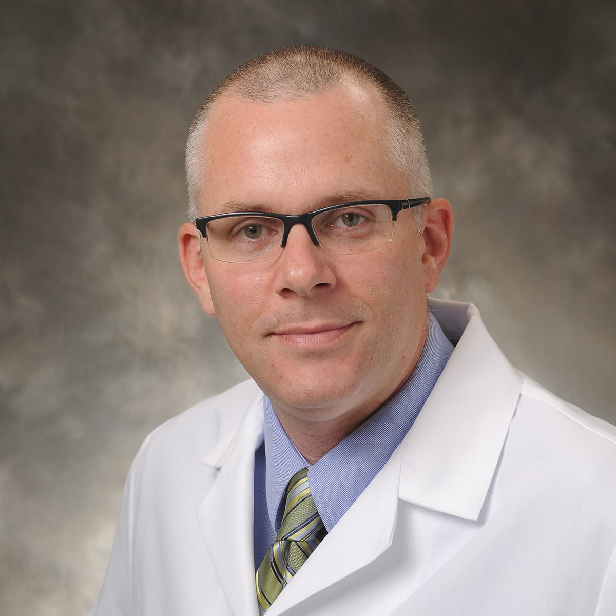 A friendly headshot of Jeffrey Ellington, MD