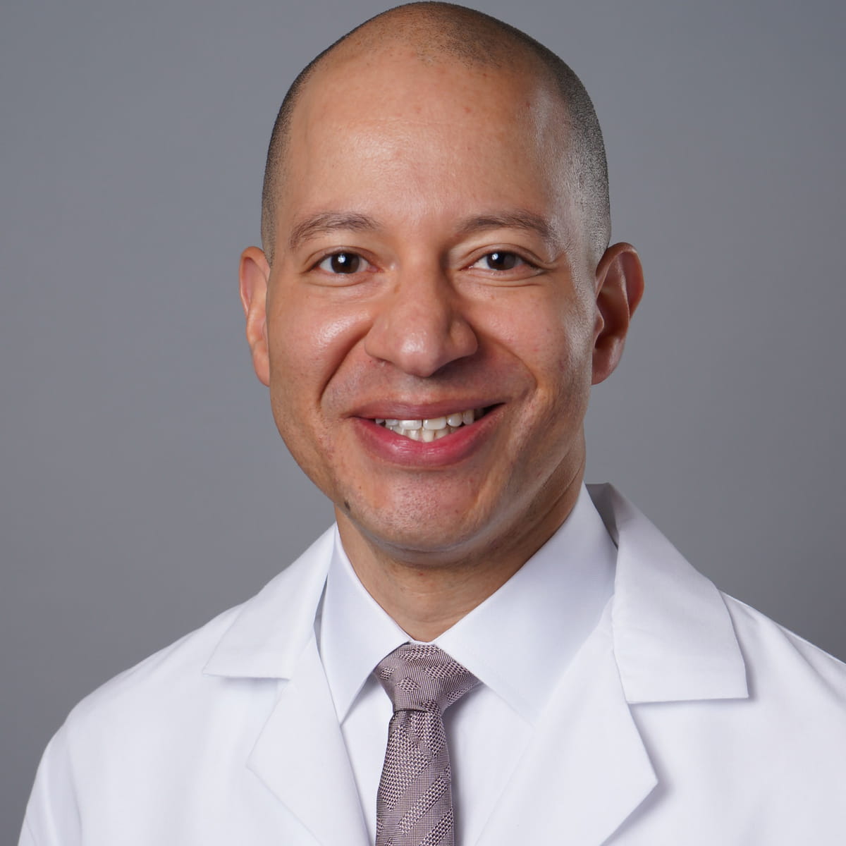 A friendly headshot of Jeremy Ragland, MD