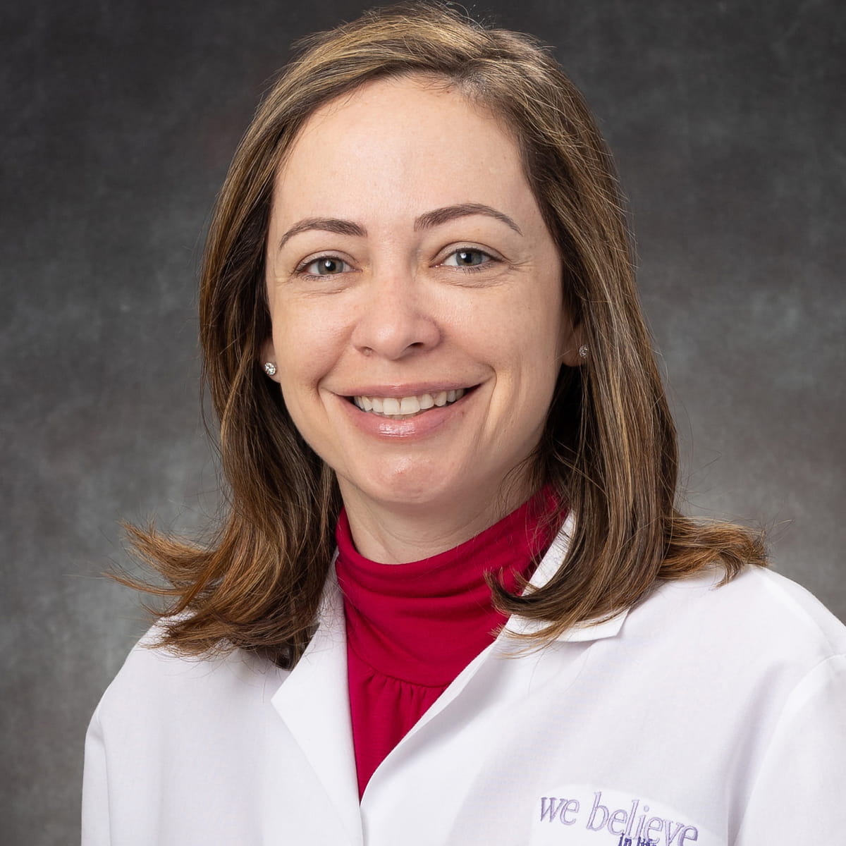 A friendly headshot of Joanna Miragaya, MD