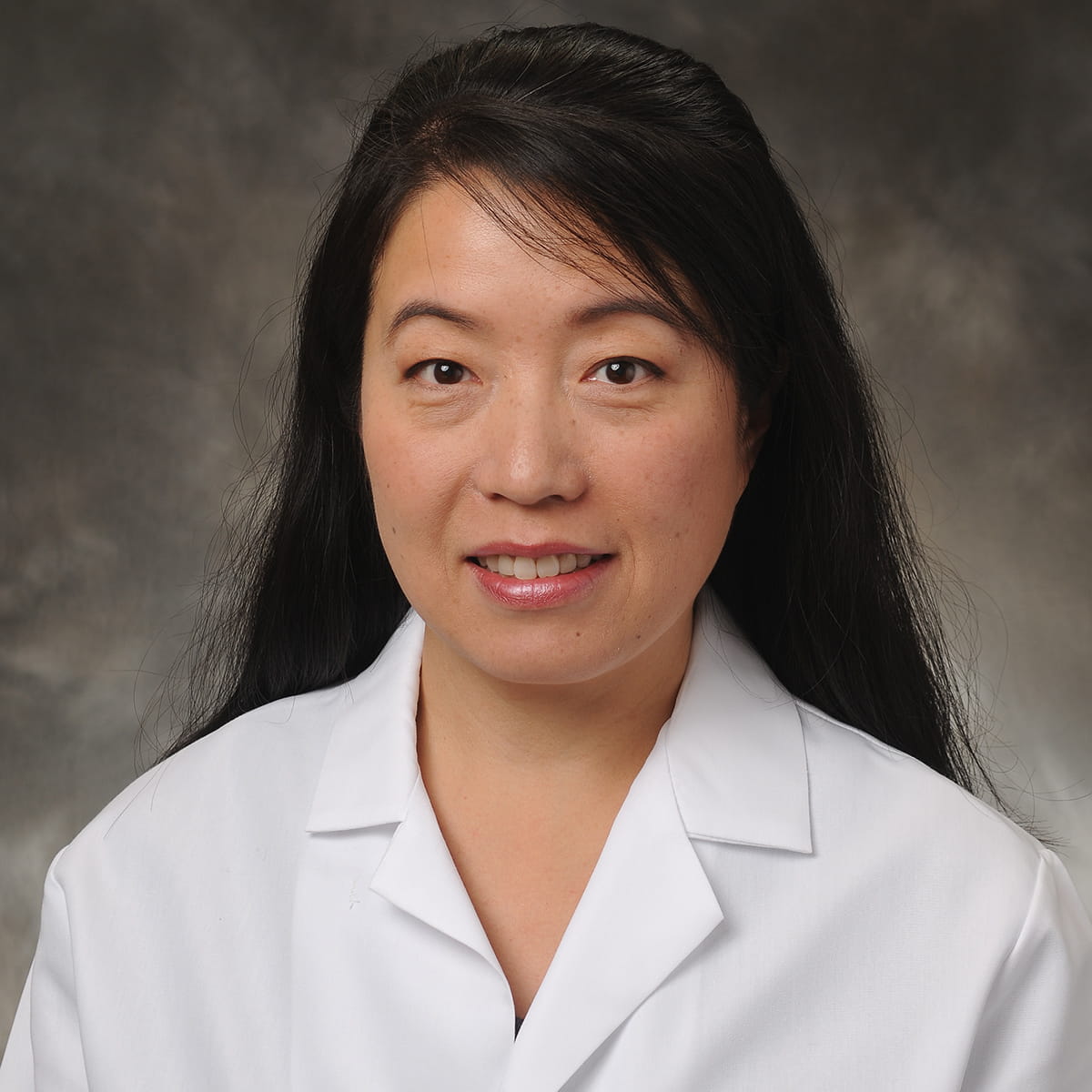 A friendly headshot of Joanne Zhu, MD