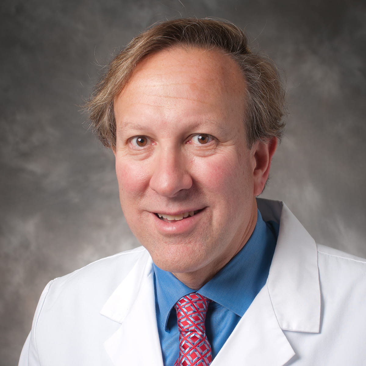 A friendly headshot of Joel Wachs, MD