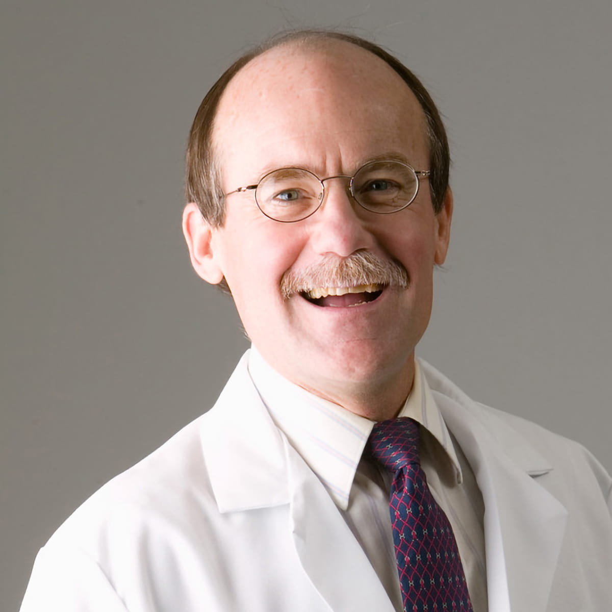 A friendly headshot of Karl Steinichen, MD