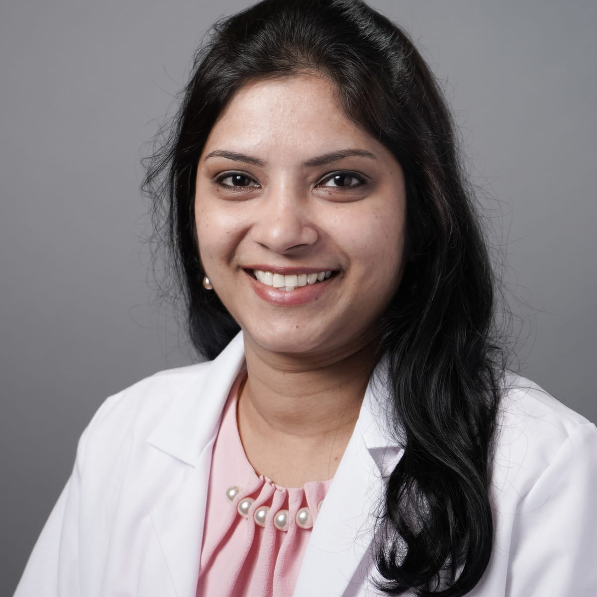 A friendly headshot of Keerthana Mugundu, MD