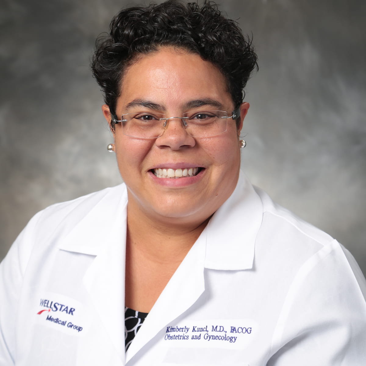 A friendly headshot of Kimberly Kuncl, MD