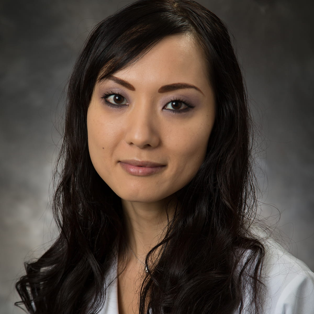 A friendly headshot of Kumiko Owada, MD