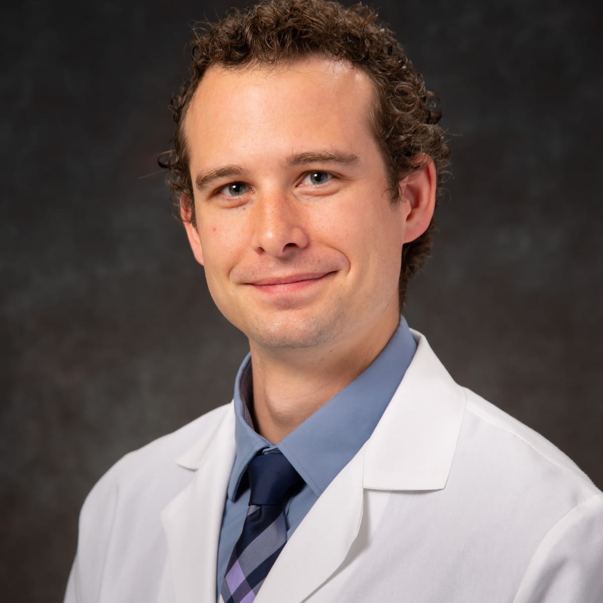A friendly headshot of Kyle Grubbs, MD