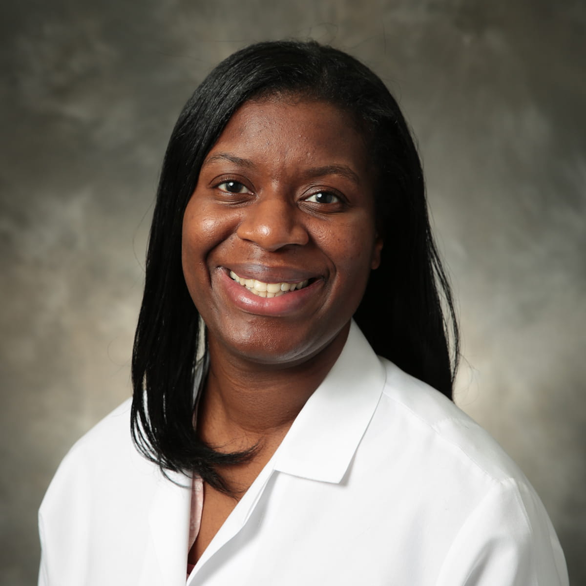 A friendly headshot of Latoya Etheridge, MD