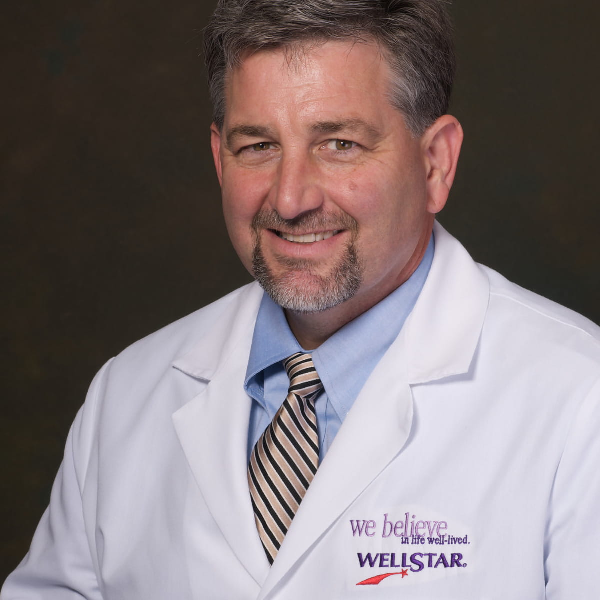 A friendly headshot of Mark Wyatt, MD