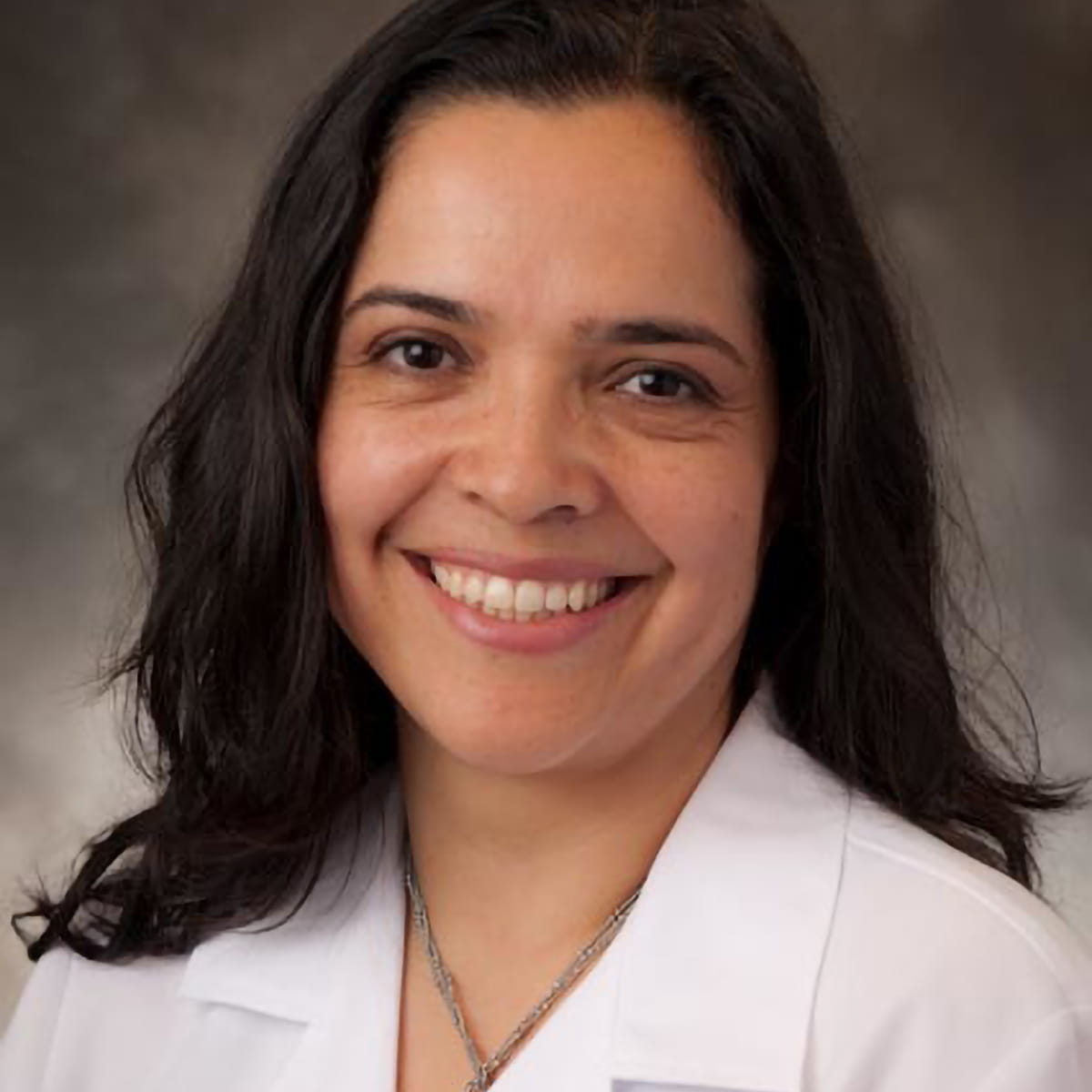 A friendly headshot of Martha Aguilera, MD