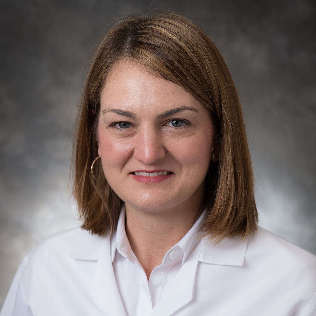 A friendly headshot of Melissa Schepp, MD