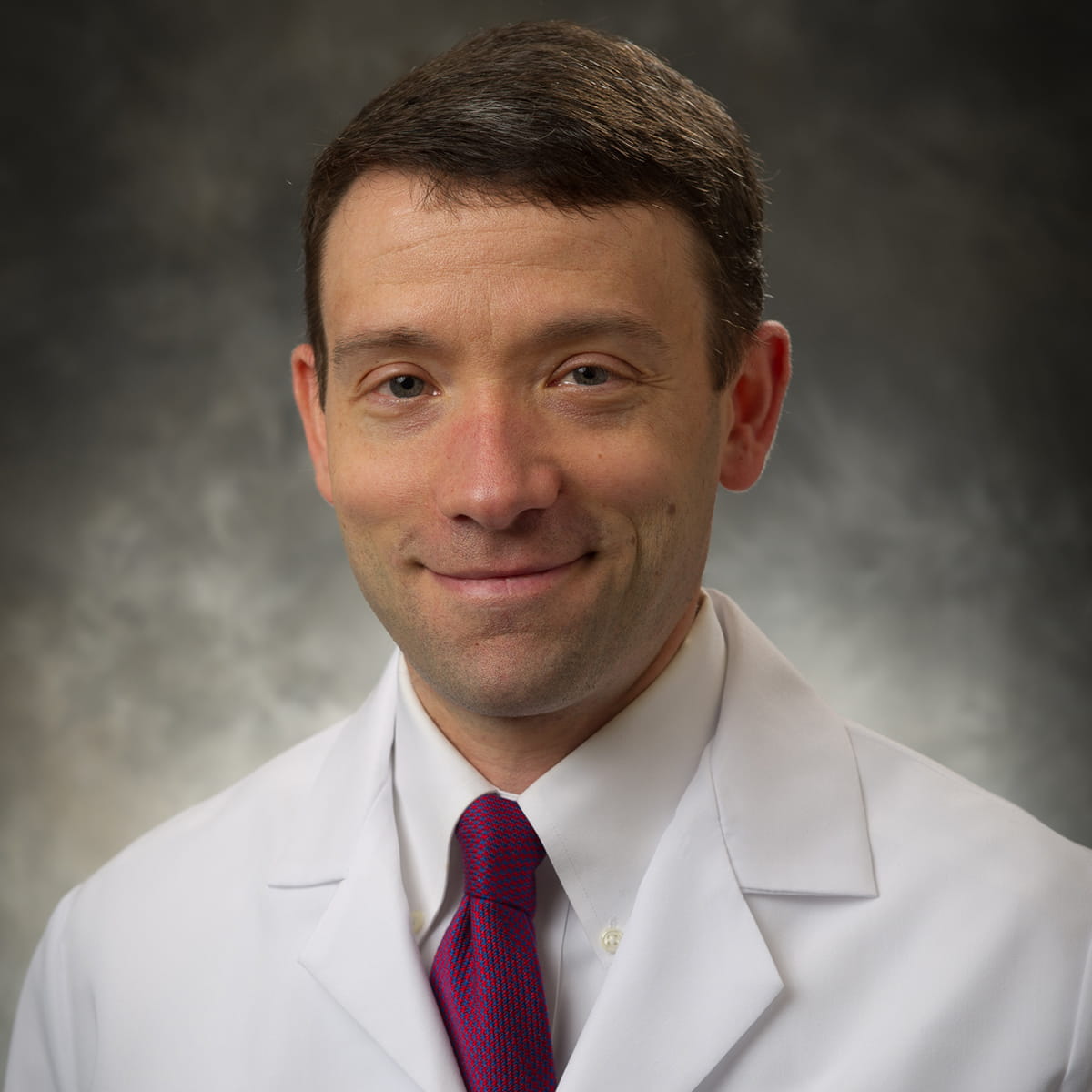 A friendly headshot of Micah Tepper, MD