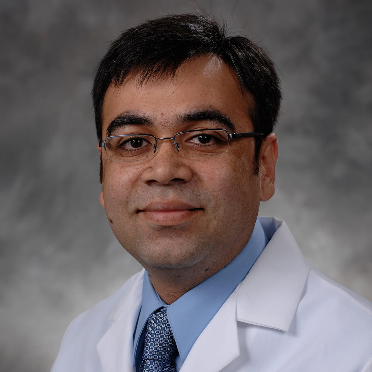 A friendly headshot of Mohammad Kamran, MD