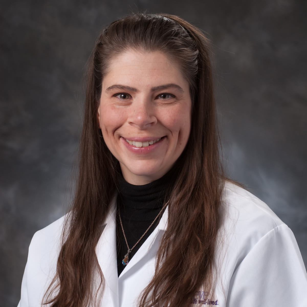 A friendly headshot of Monica Gilbert, MD