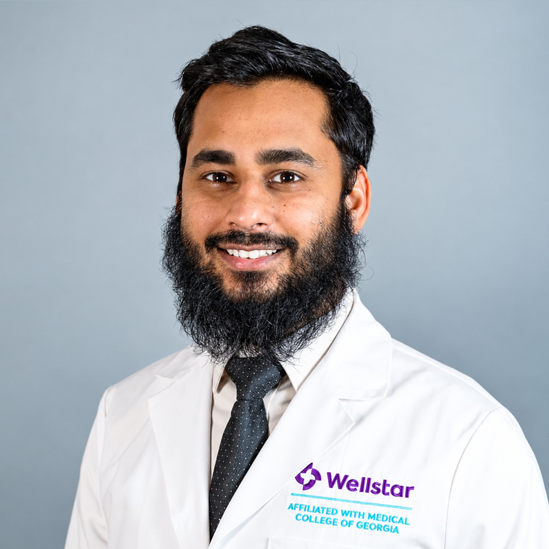 A friendly headshot of Muhammad Ashraf, MD