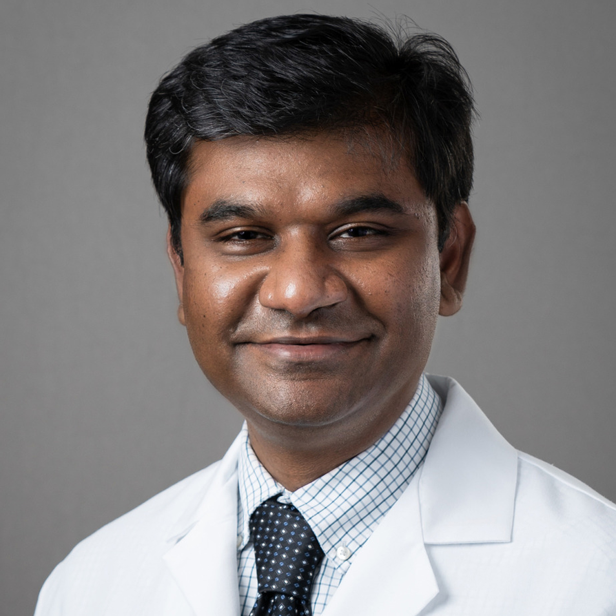 A friendly headshot of Muthu Bhaskaran, MD