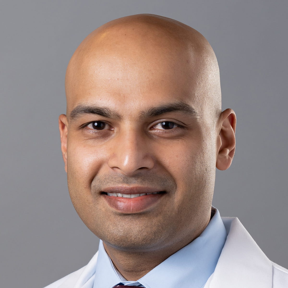 A friendly image of Vineet Nair, MD