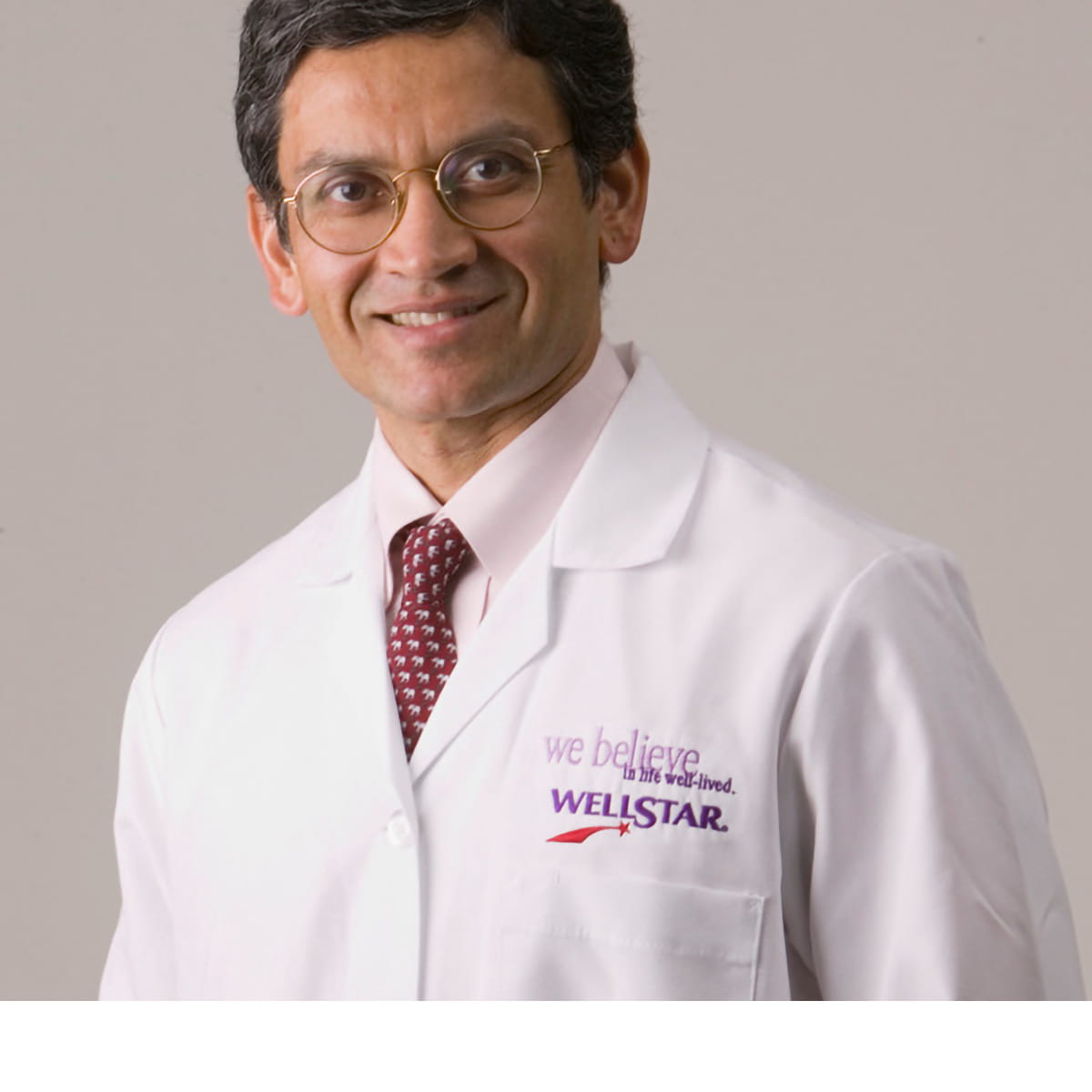 A friendly headshot of Nitin Mayur, MD