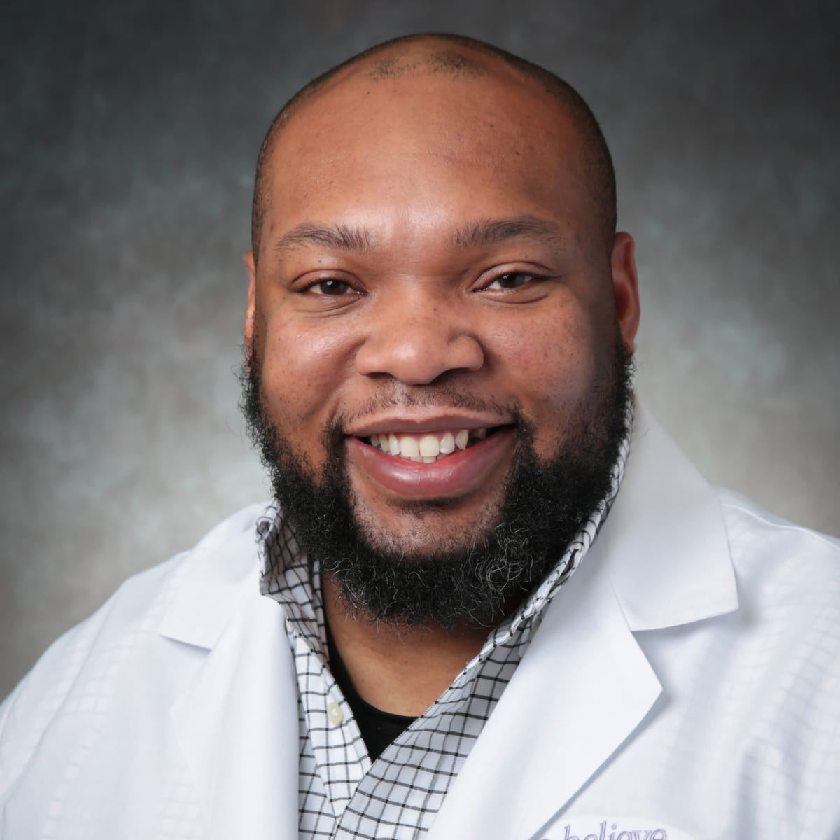 A friendly headshot of Paul Chukelu, MD