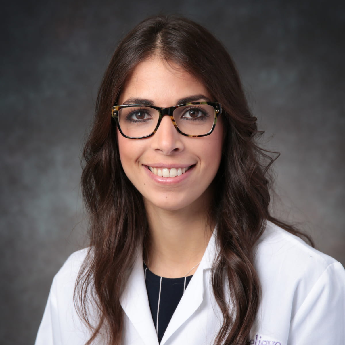 A friendly headshot of Raisa Martinez Martinez, MD