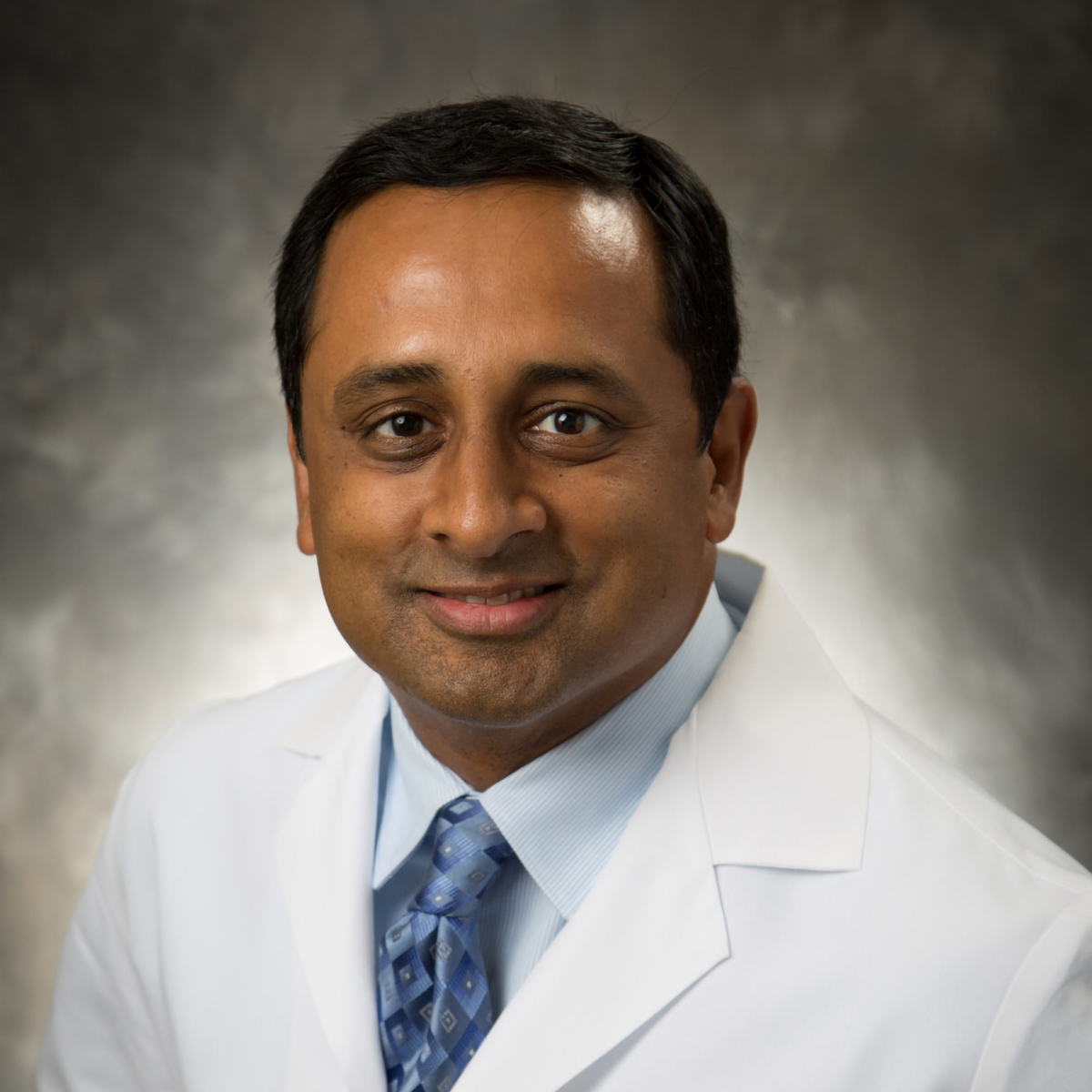 A friendly headshot of Ravi Edupuganti, MD