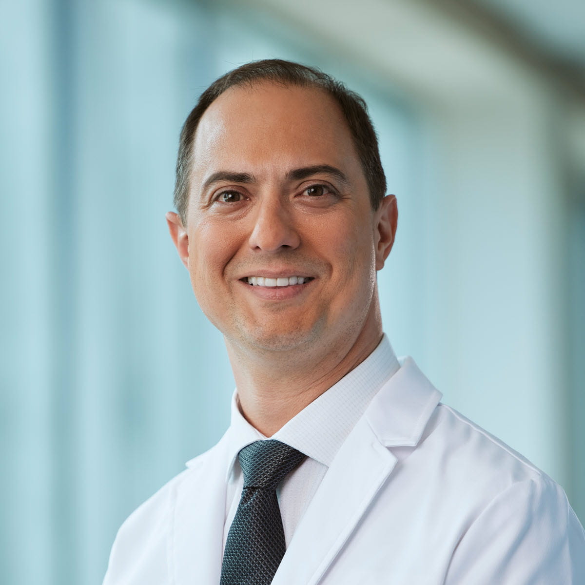 A friendly headshot of Raymond Walkup, MD