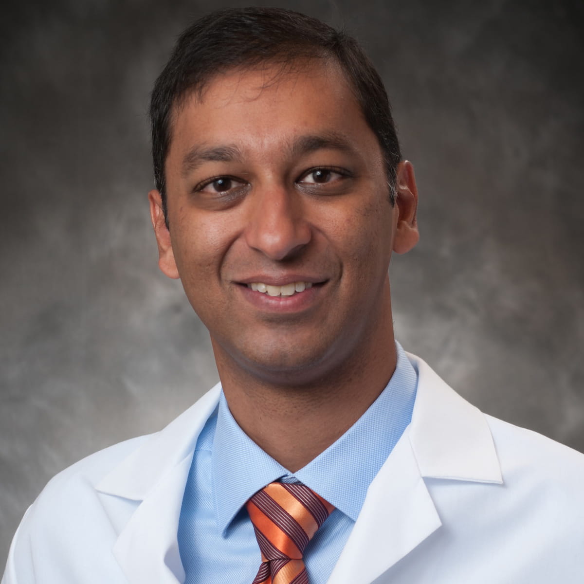 A friendly headshot of Rishi Gupta, MD