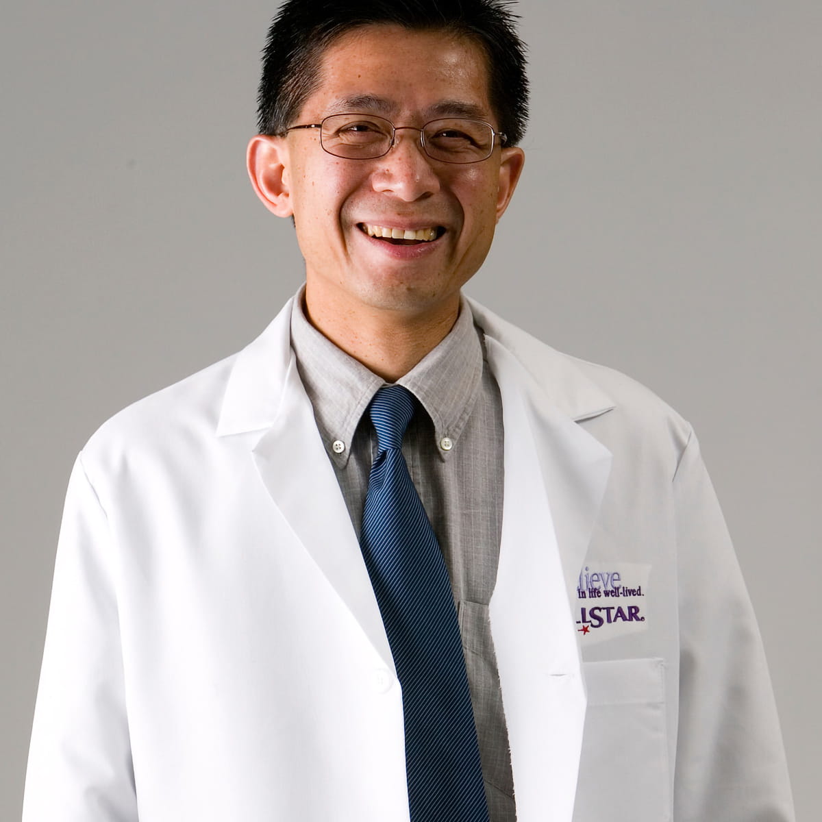 A friendly headshot of Roaj Ujjin, MD