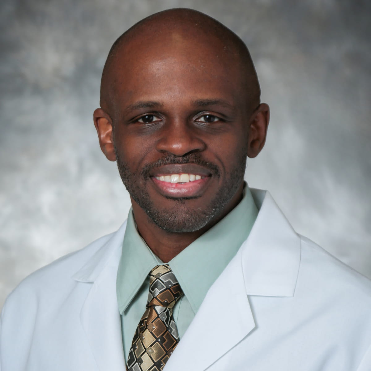 A friendly headshot of Ron Alleyne, MD