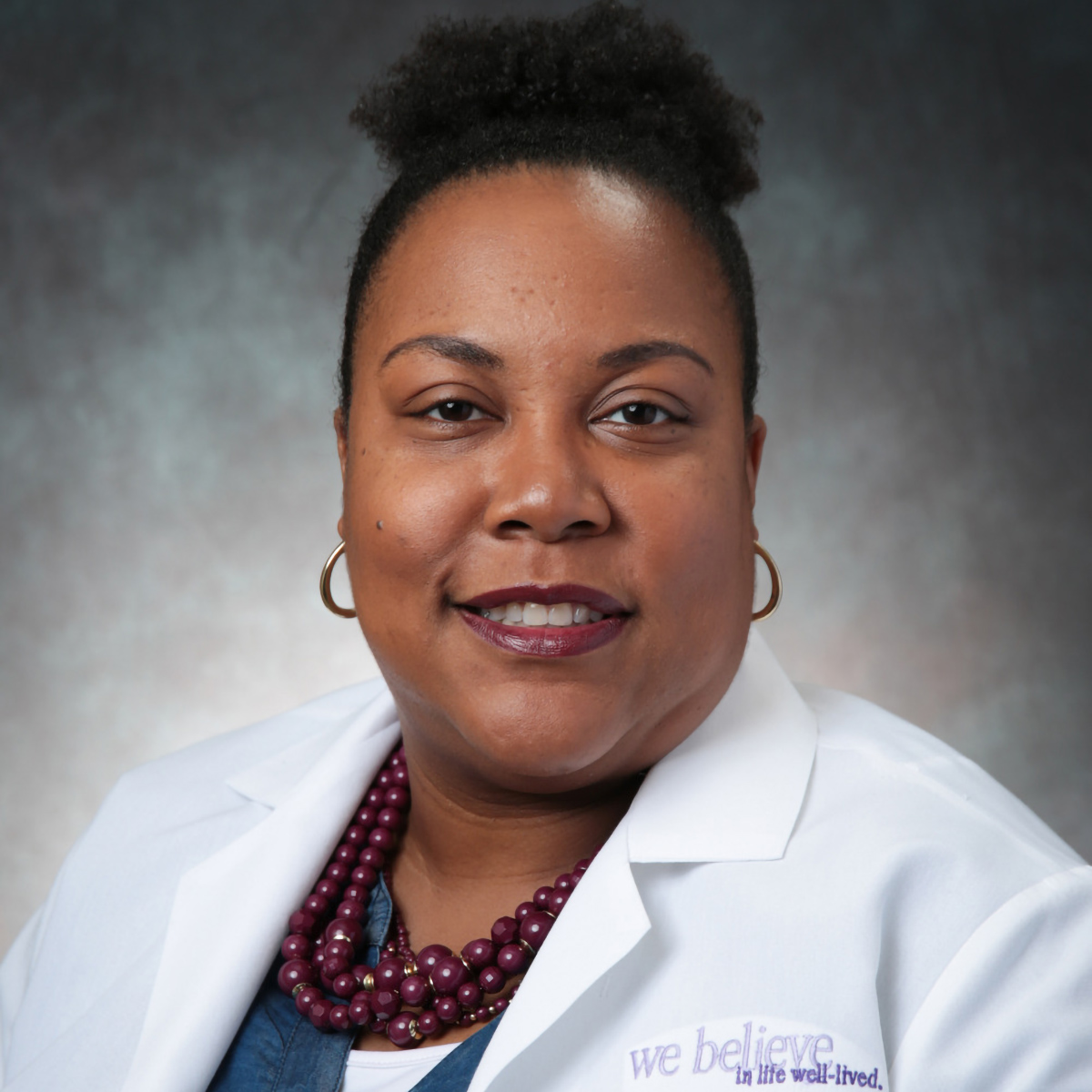 A friendly headshot of Rushia Slaton, MD