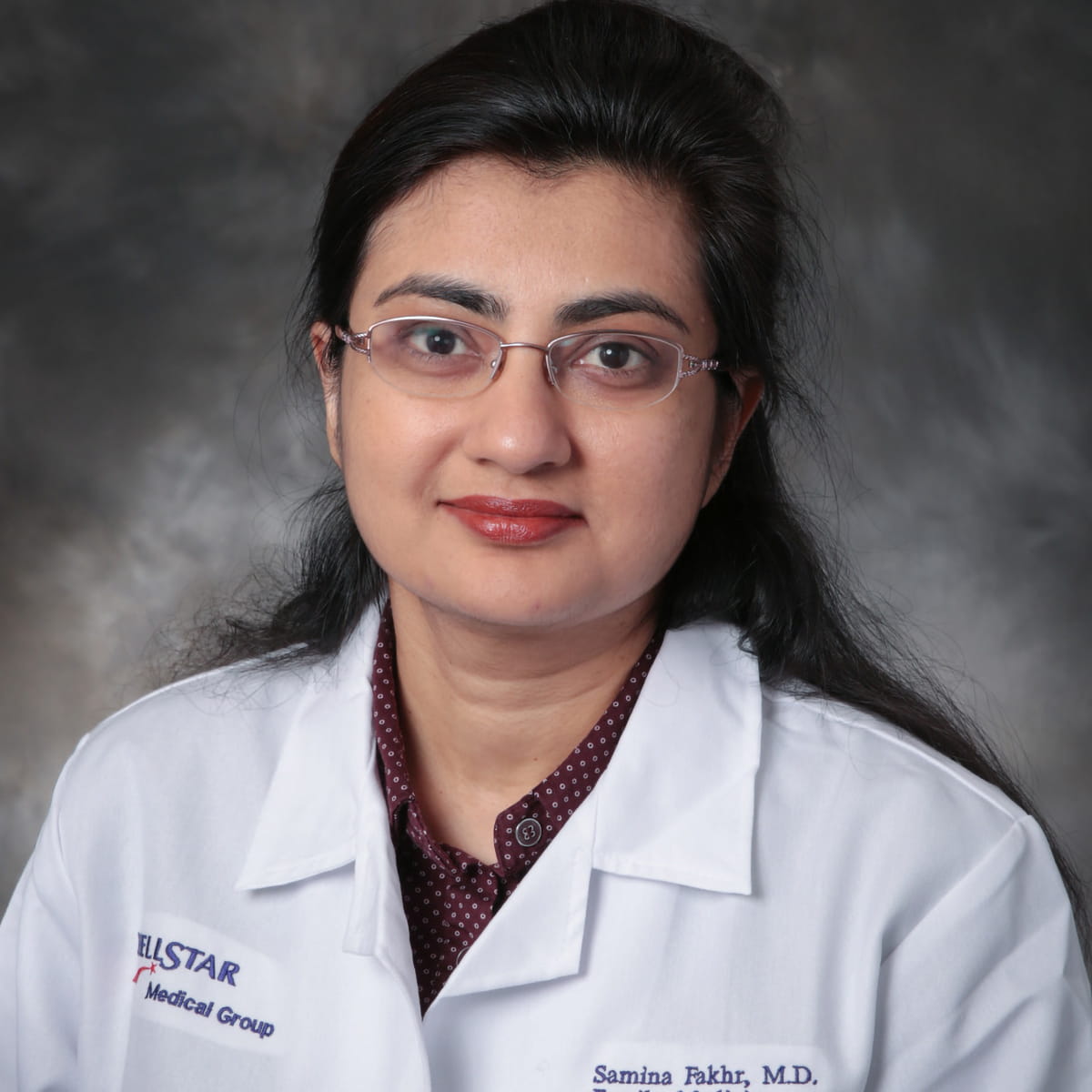 A friendly headshot of Samina Fakhr, MD