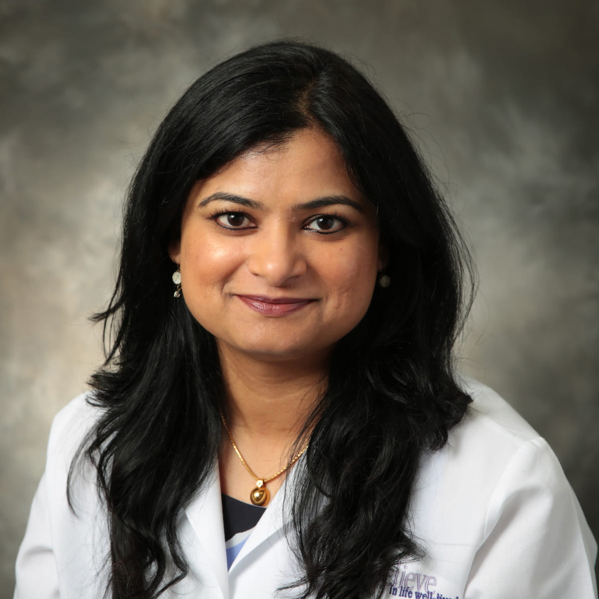 A friendly headshot of Dr. Sara Sambandham
