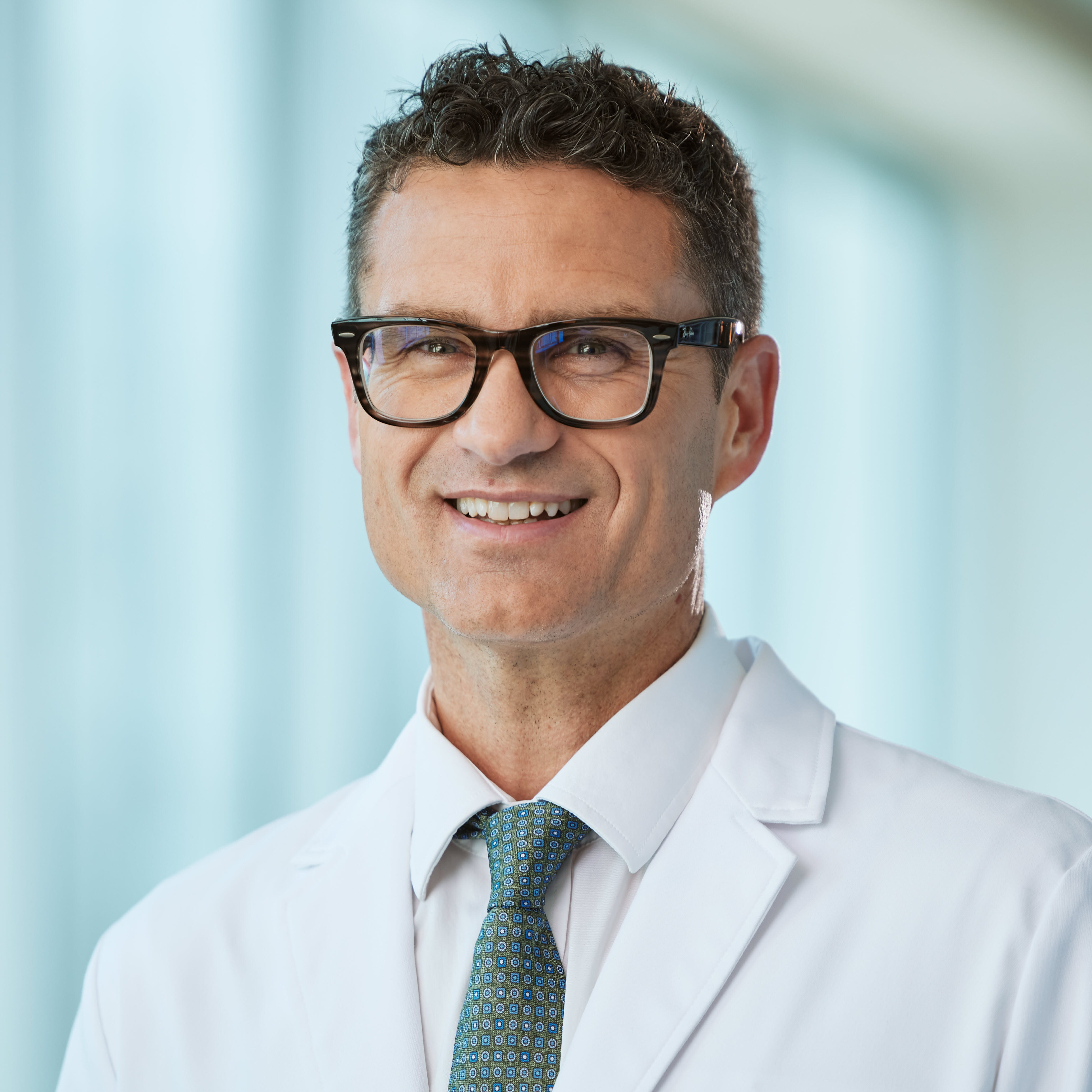 A friendly headshot of Shane Mangrum, MD