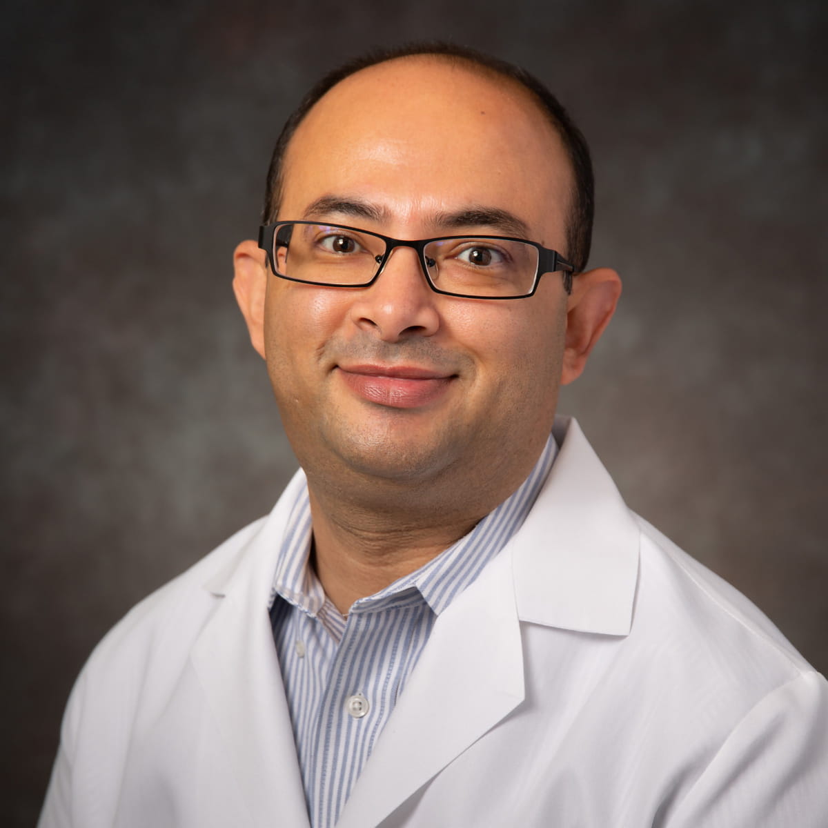 A friendly headshot of Shiraj Panjwani, MD