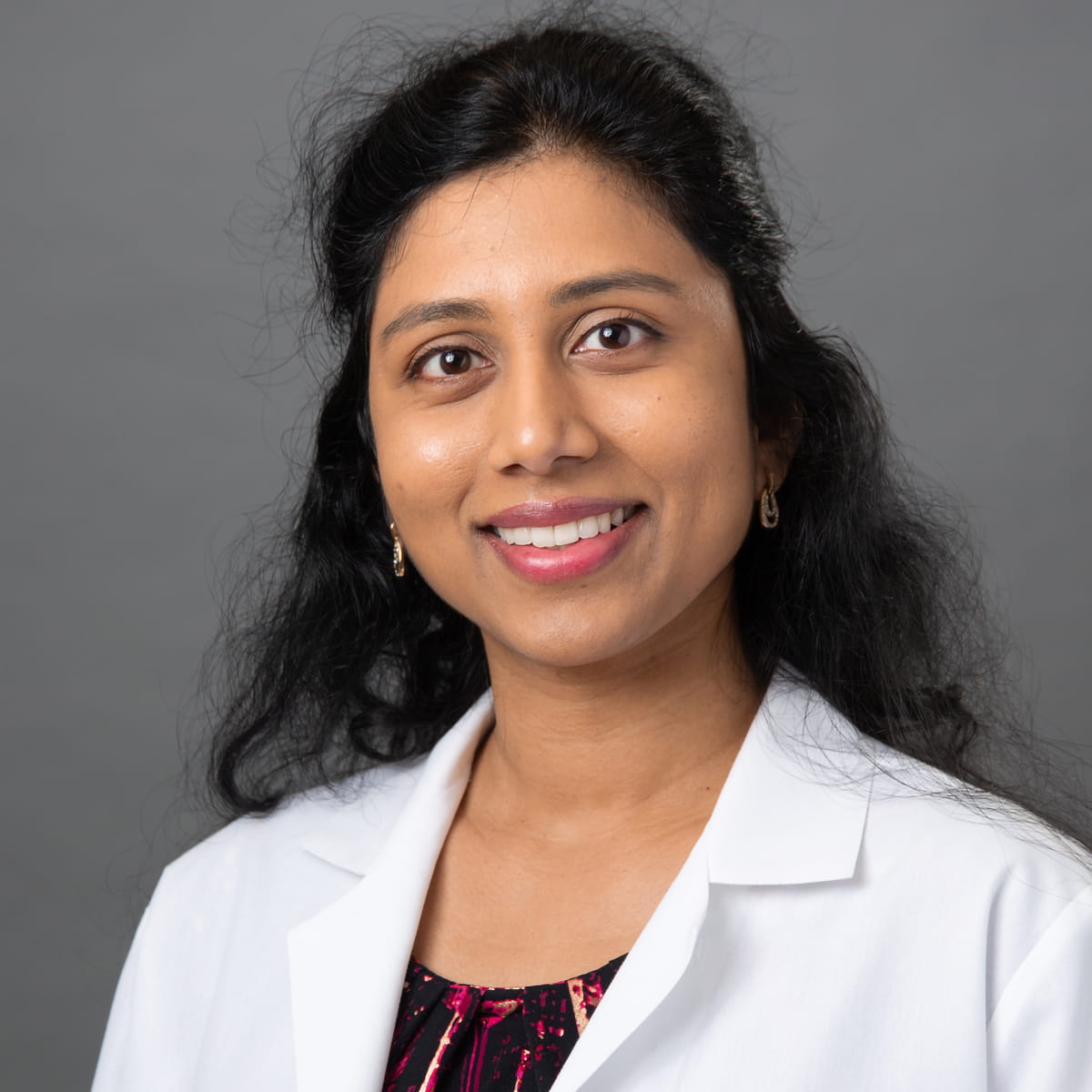 A friendly headshot of Sowmya Barrela, MD