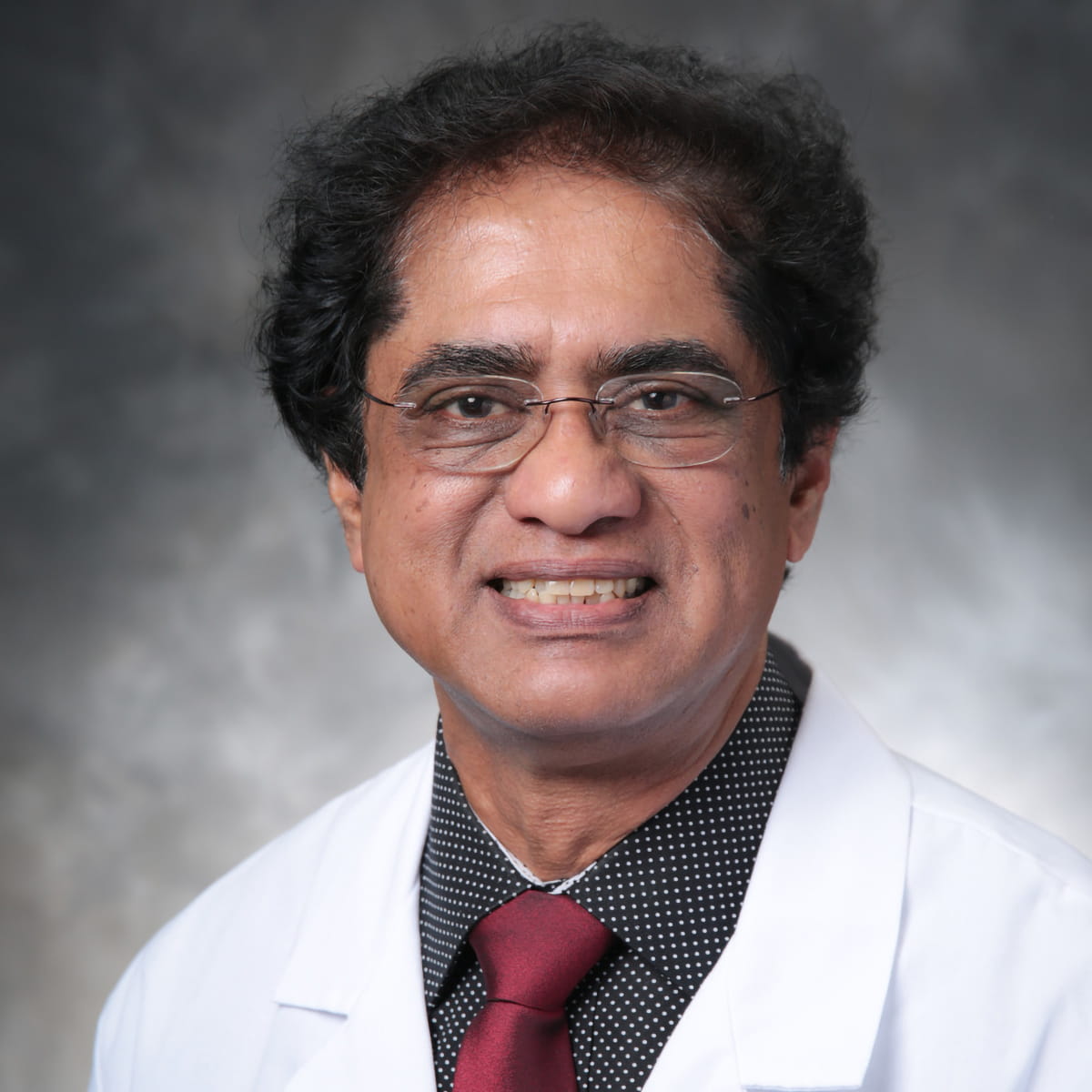 A friendly headshot of Syed Zafar, MD