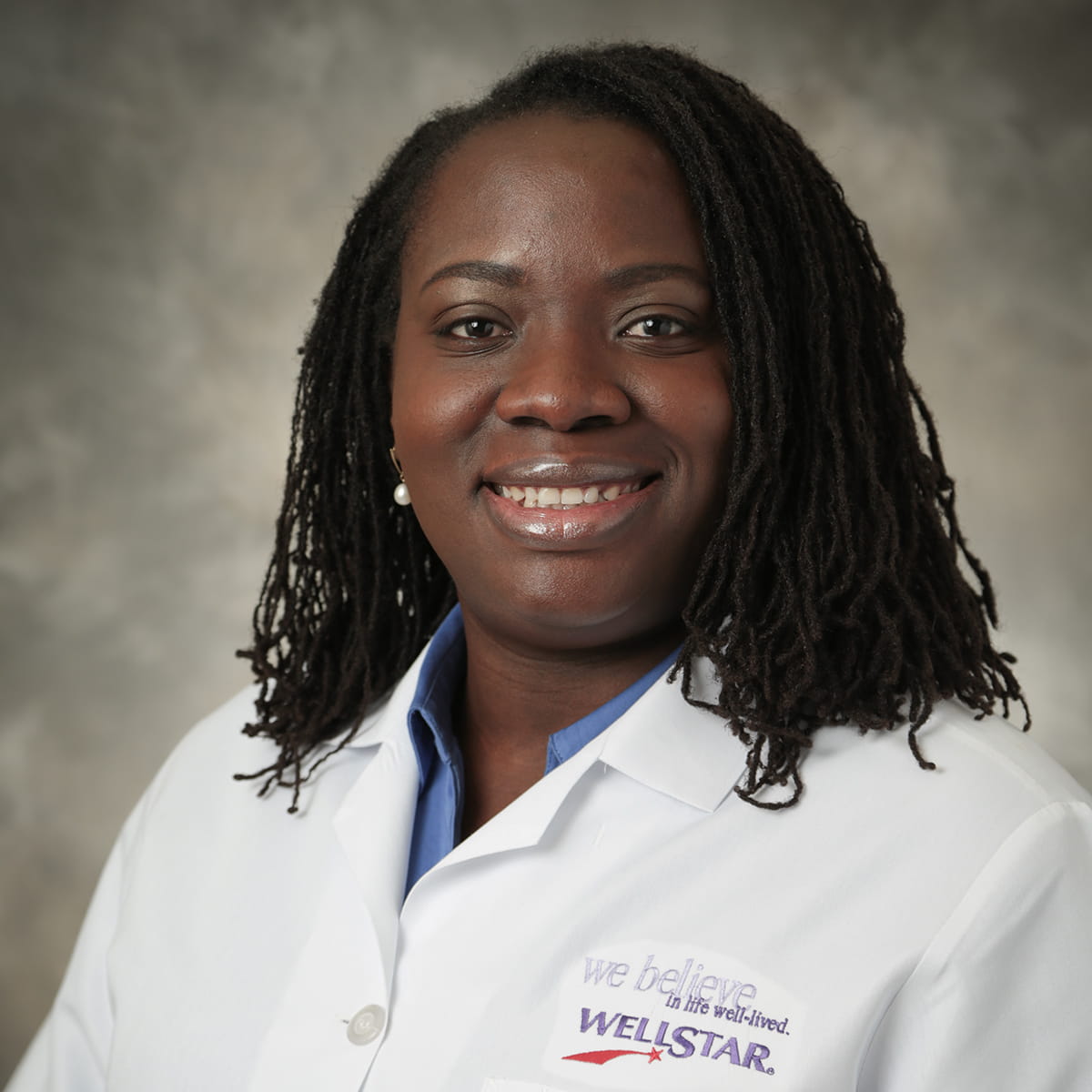 A friendly headshot of Ufuoma Philemon, MD