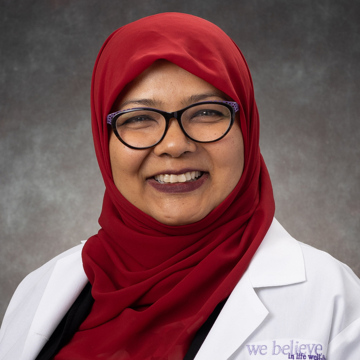 A friendly headshot of Umme Nur, MD