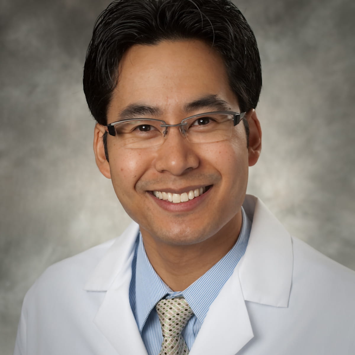 A friendly headshot of Vanchad Memark, MD