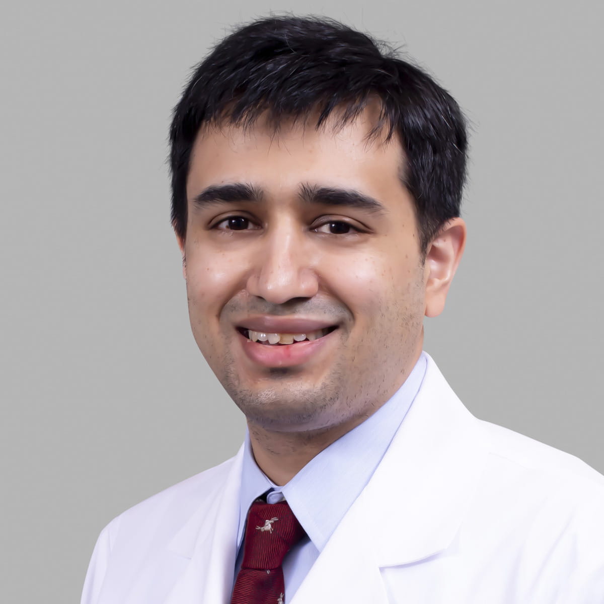 A friendly headshot of Vivek Nautiyal, MD