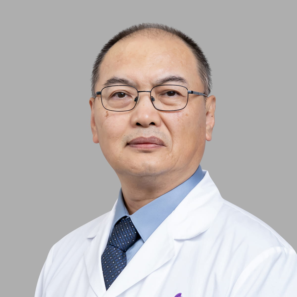 A friendly image of Weihua Tang MD